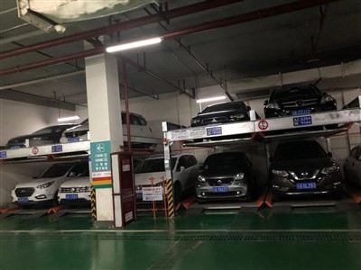 Підземна дворівнева підйомно-розсувна система паркування